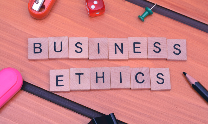 business ethics spelled out using tiles of letters